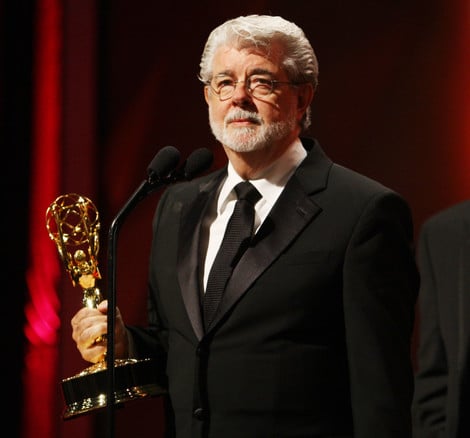 George Lucas holding his award