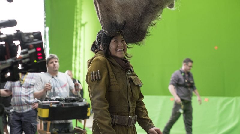 Kelly Marie Tran filming in front of a green screen