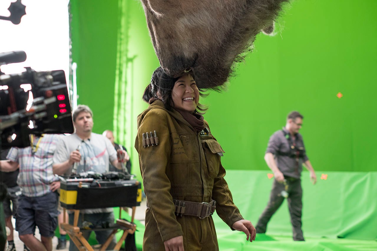 Kelly Marie Tran filming in front of a green screen