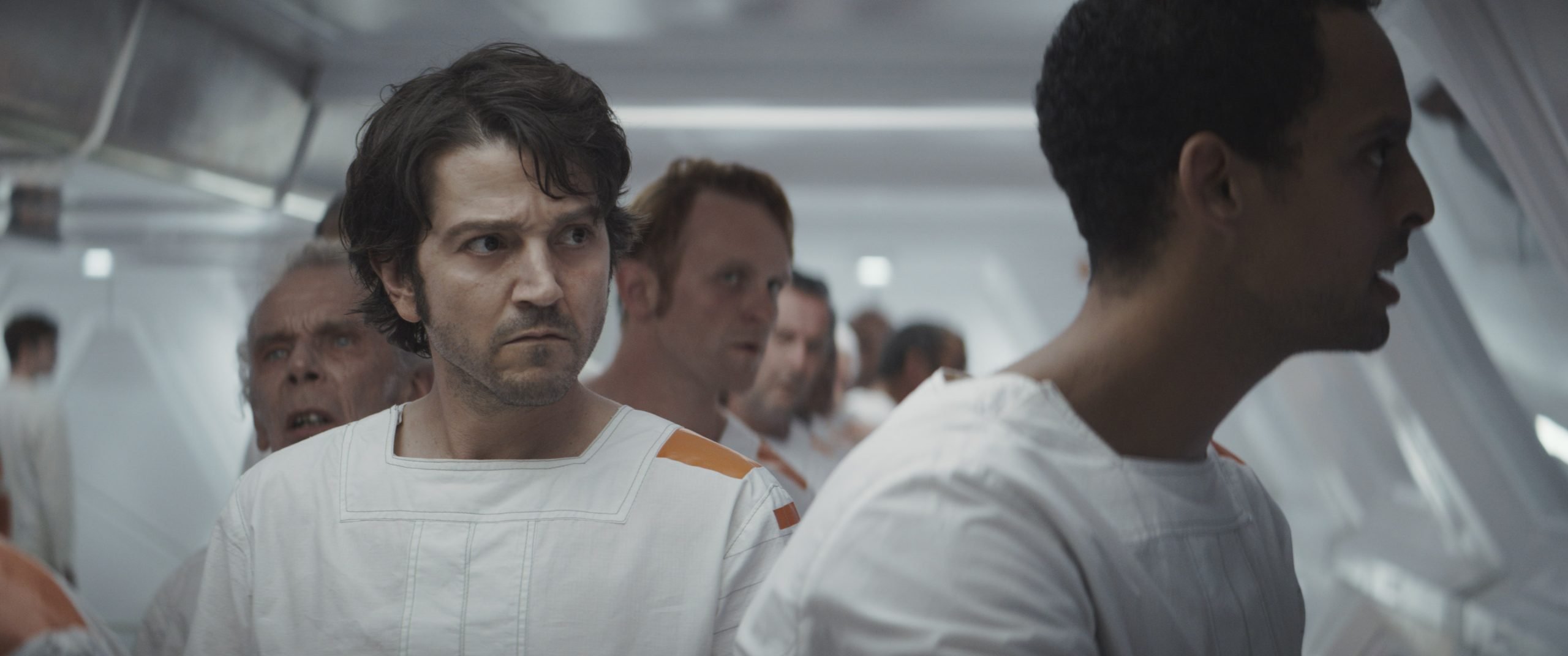 Cassian Andor with inmates