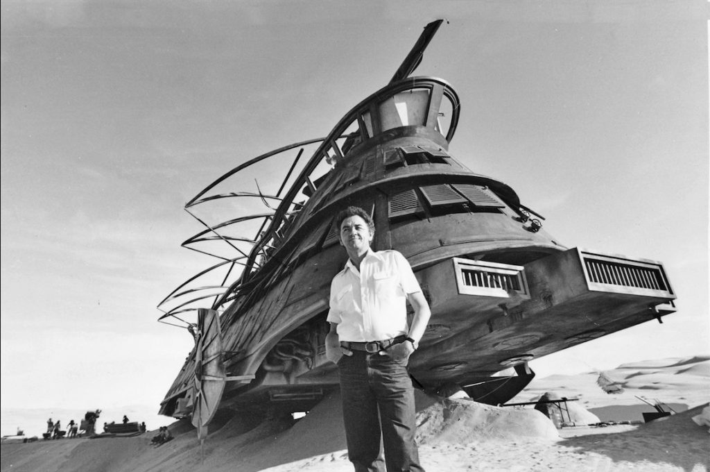 Norman Reynolds in front of the sail barge